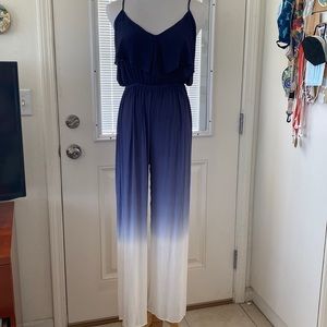 Super cute ombré blue jumper with cross-cross back detail.